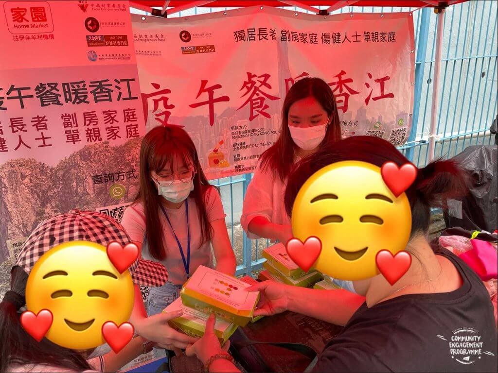 Distributing lunch boxes to the underprivileged